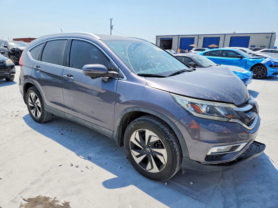 Photo 4 from auction – 2016 HONDA CR-V with VIN 5J6RM3H93GL011691
