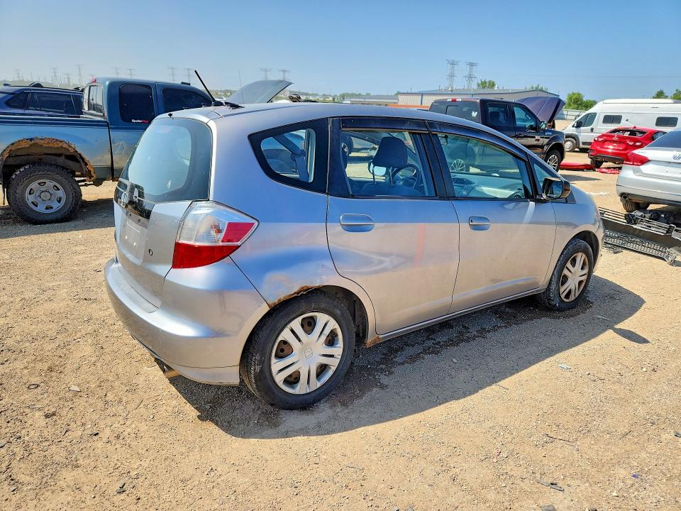Photo 3 from auction – 2009 HONDA FIT with VIN JHMGE88279S008861