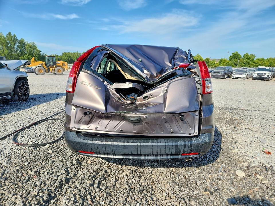 Photo 6 from auction – 2013 HONDA CR-V with VIN 3CZRM3H33DG707794