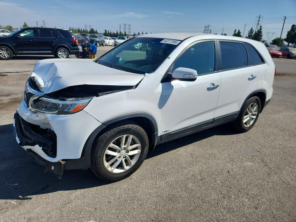 KIA SORENTO 2015 with VIN 5XYKTCA61FG636630 - Photo from auction