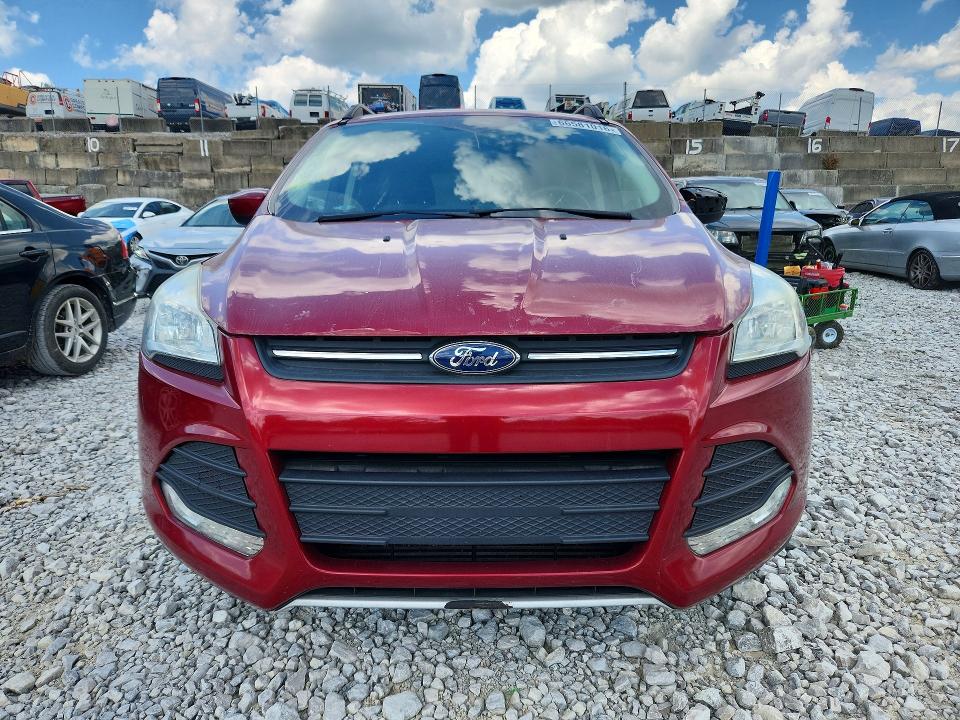 Photo 5 from auction – 2016 FORD ESCAPE with VIN 1FMCU9G92GUC75751