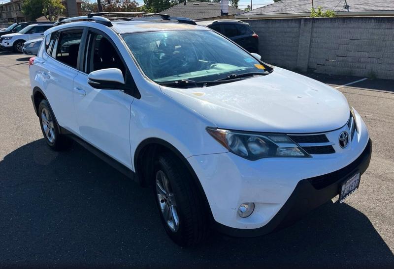 TOYOTA RAV4 2015 with VIN 2T3WFREV0FW184149 - Photo from auction