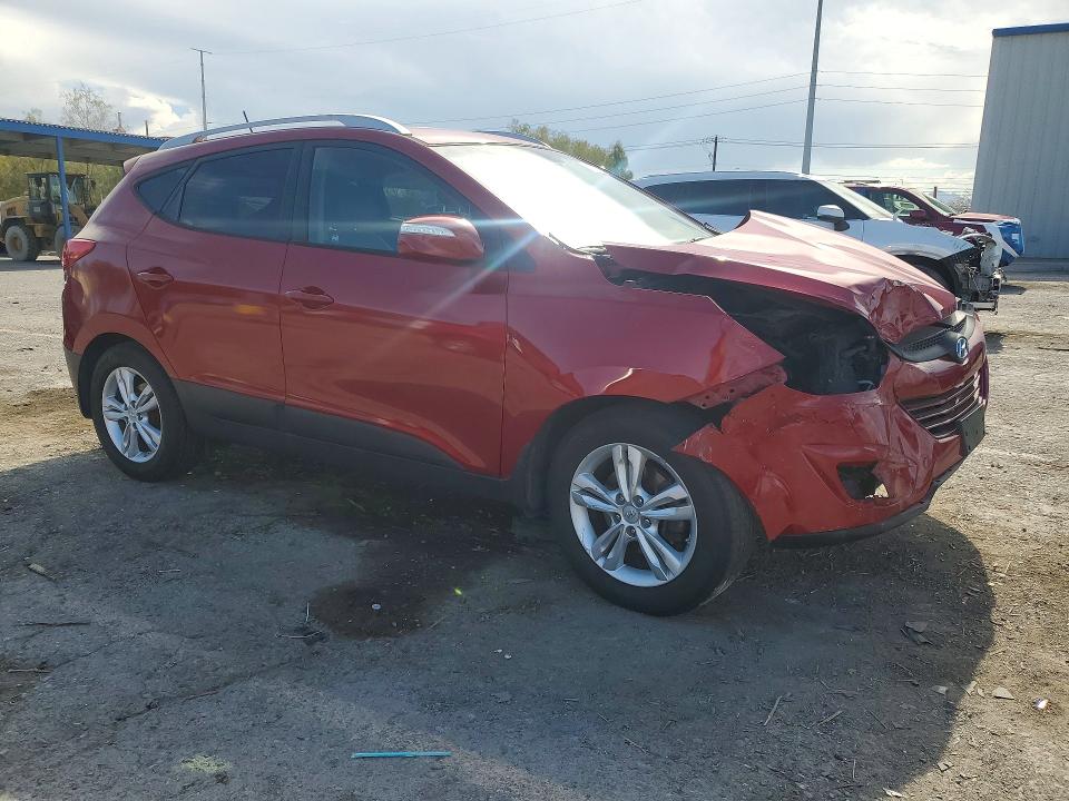 Photo 4 from auction – 2012 HYUNDAI TUCSON with VIN KM8JUCAC5CU511179