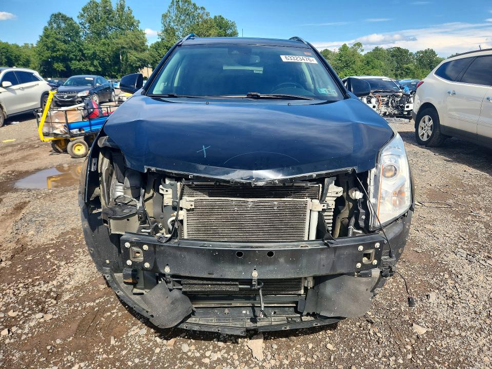Photo 5 from auction – 2016 CADILLAC SRX with VIN 3GYFNEE36GS577947