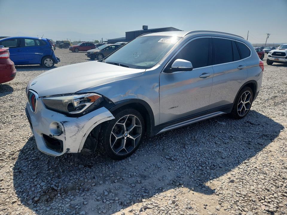 BMW X1 2016 with VIN WBXHT3C39GP888950 - Photo from auction