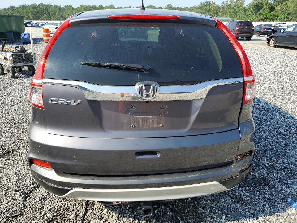 Photo 6 from auction – 2015 HONDA CR-V with VIN 2HKRM3H55FH545314