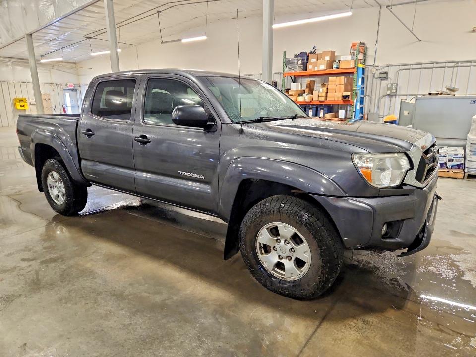 Photo 4 from auction – 2014 TOYOTA TACOMA with VIN 3TMLU4EN6EM143181