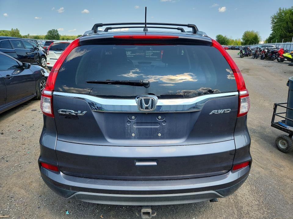 Photo 6 from auction – 2016 HONDA CR-V with VIN 2HKRM4H34GH130801