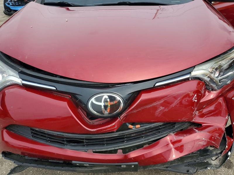 Photo 12 from auction – 2018 TOYOTA RAV4 with VIN 2T3BFREV0JW827185