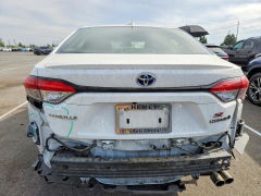 Photo 6 from auction – 2023 TOYOTA COROLLA HYBRID with VIN JTDBCMFE2PJ009586