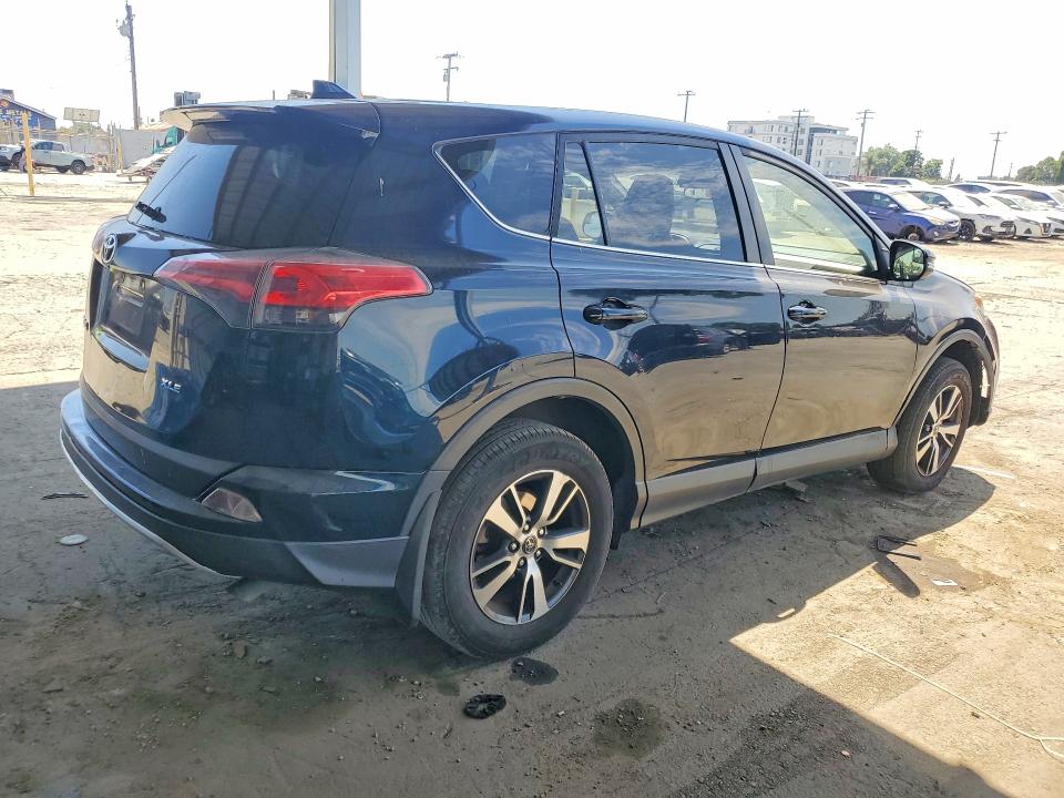 Photo 3 from auction – 2018 TOYOTA RAV4 with VIN JTMWFREV7JJ188531