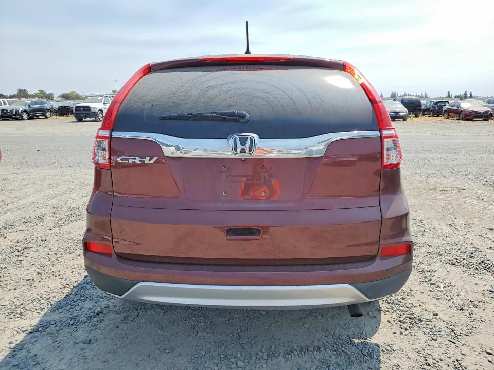Photo 6 from auction – 2016 HONDA CR-V with VIN 3CZRM3H54GG722147