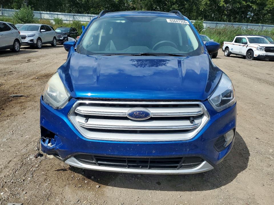 Photo 5 from auction – 2017 FORD ESCAPE with VIN 1FMCU9GD0HUC94899