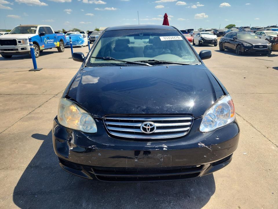 Снимка 5 от търг – 2003 TOYOTA COROLLA с VIN JTDBR32E230004774