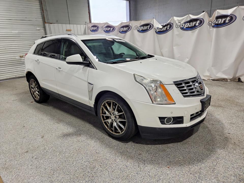 Photo 4 from auction – 2014 CADILLAC SRX with VIN 3GYFNGE3XES661147
