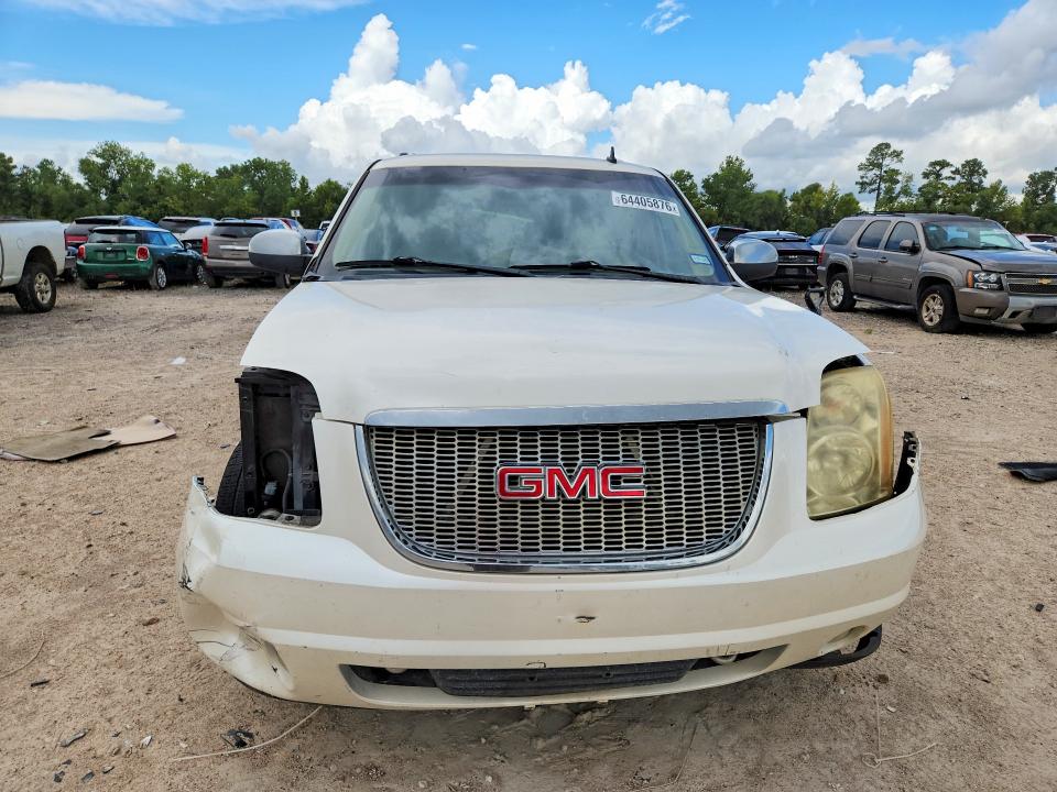 Photo 5 from auction – 2011 GMC YUKON XL with VIN 1GKS1KE06BR397694