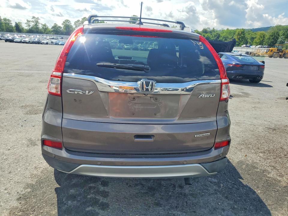 Photo 6 from auction – 2015 HONDA CR-V with VIN 5J6RM4H94FL041898