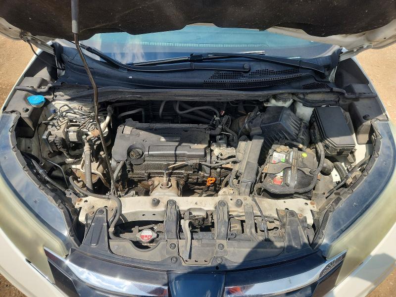 Photo 12 from auction – 2016 HONDA CR-V with VIN 5J6RM4H79GL014213