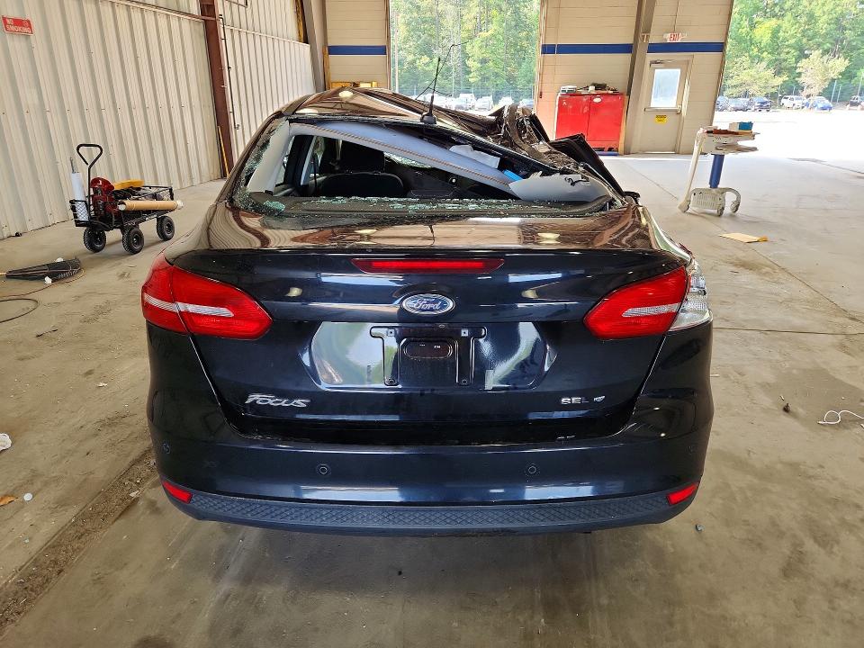 Photo 6 from auction – 2018 FORD FOCUS with VIN 1FADP3H23JL314204