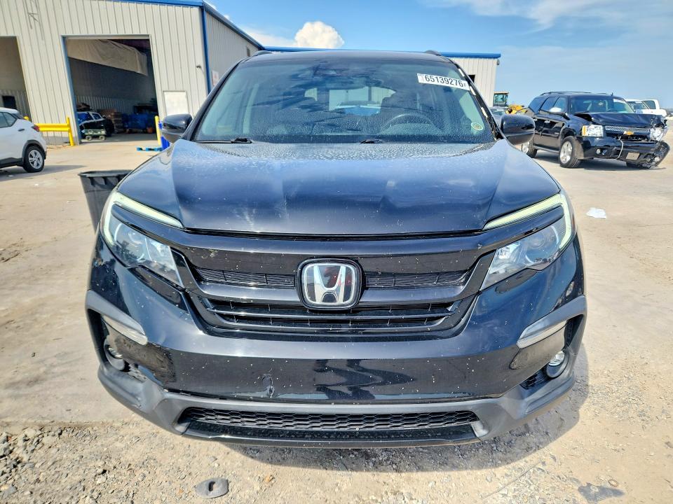 Photo 5 from auction – 2021 HONDA PILOT with VIN 5FNYF5H22MB046991