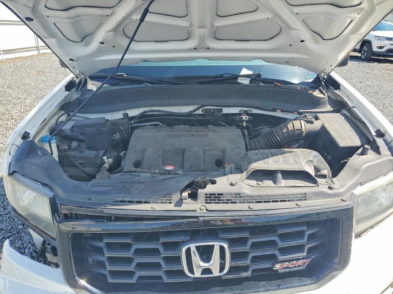 Photo 12 from auction – 2012 HONDA RIDGELINE with VIN 5FPYK1F7XCB001743