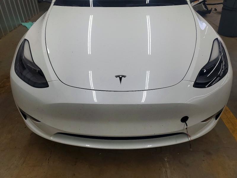Photo 11 from auction – 2023 TESLA MODEL Y with VIN 7SAYGDEE7PF763657