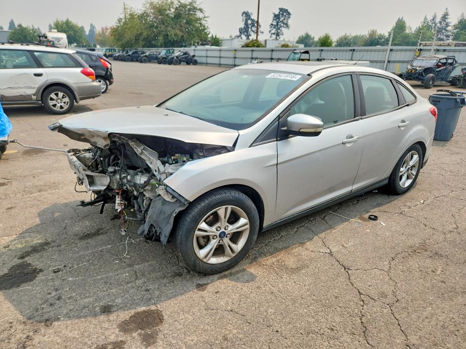 FORD FOCUS 2014 with VIN 1FADP3F24EL301664 - Photo from auction