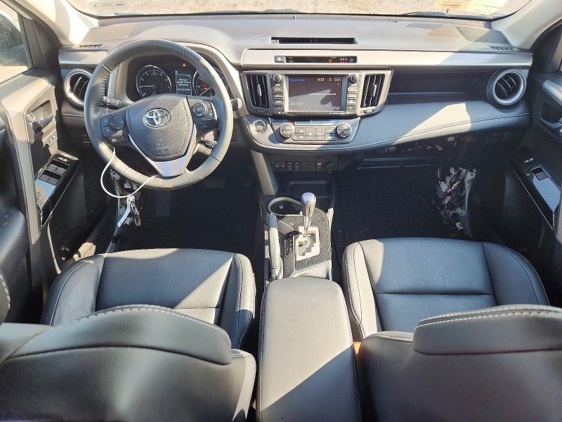 Photo 8 from auction – 2018 TOYOTA RAV4 with VIN 2T3DFREV8JW696127