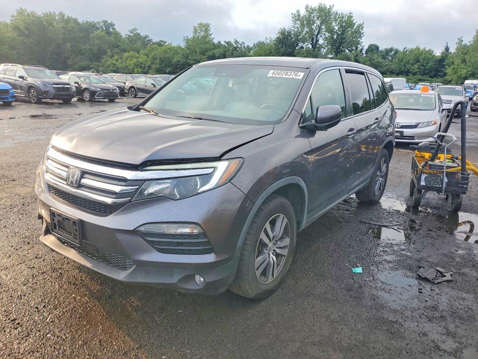 HONDA PILOT 2017 with VIN 5FNYF6H62HB070755 - Photo from auction