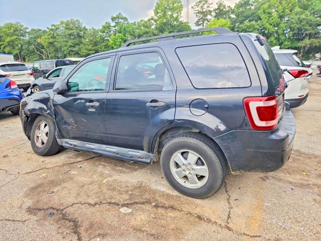 Photo 2 from auction – 2011 FORD ESCAPE with VIN 1FMCU0D70BKA41546