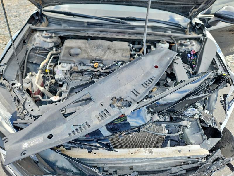 Photo 11 from auction – 2023 TOYOTA CAMRY with VIN 4T1C11AK4PU748846