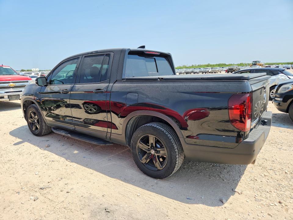 Photo 2 from auction – 2023 HONDA RIDGELINE with VIN 5FPYK3F82PB016280