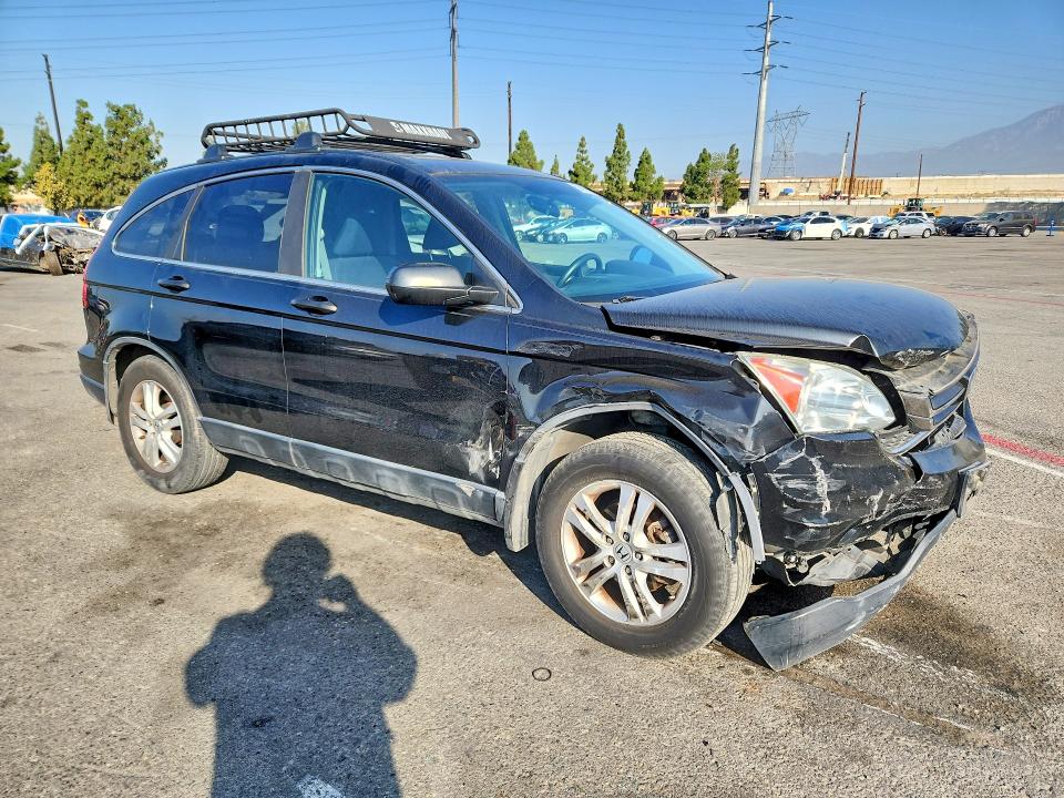 Photo 4 from auction – 2011 HONDA CR-V with VIN 5J6RE4H58BL055890
