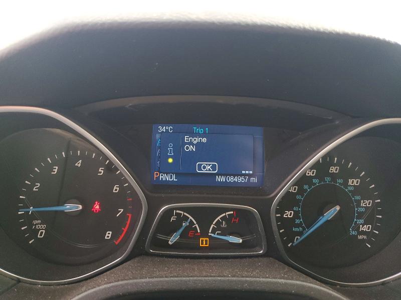 Photo 9 from auction – 2014 FORD FOCUS with VIN 1FADP3K21EL390664