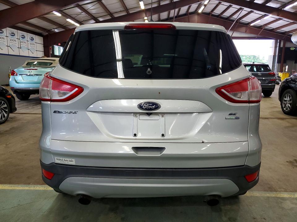 Foto 6 de la subasta – 2015 FORD ESCAPE con VIN 1FMCU9GX0FUB23481