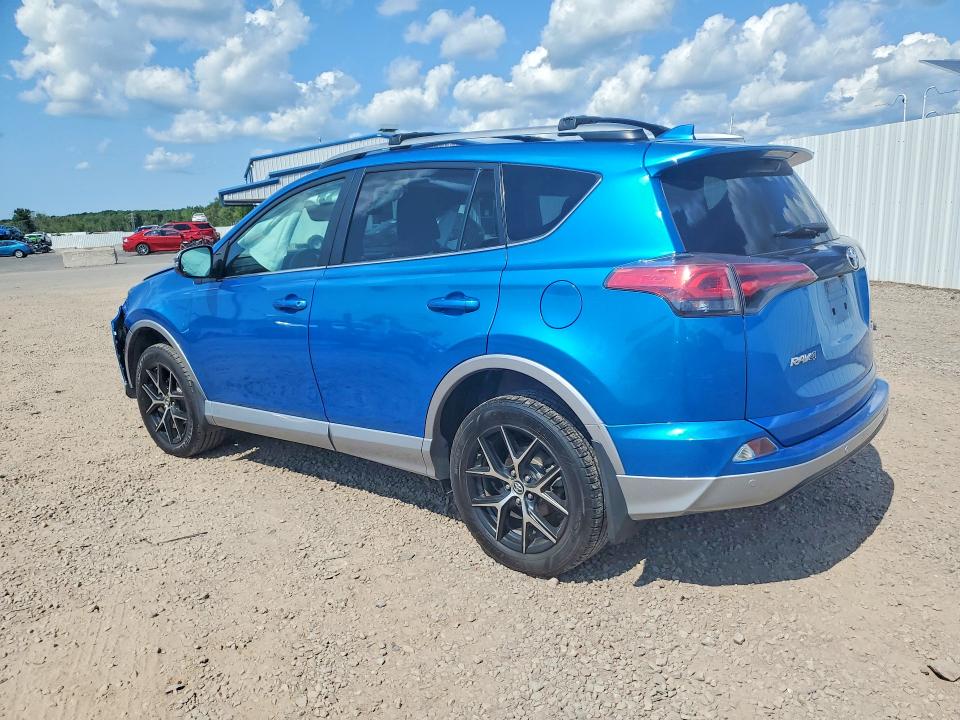 Photo 2 from auction – 2018 TOYOTA RAV4 with VIN 2T3JFREV7JW814753
