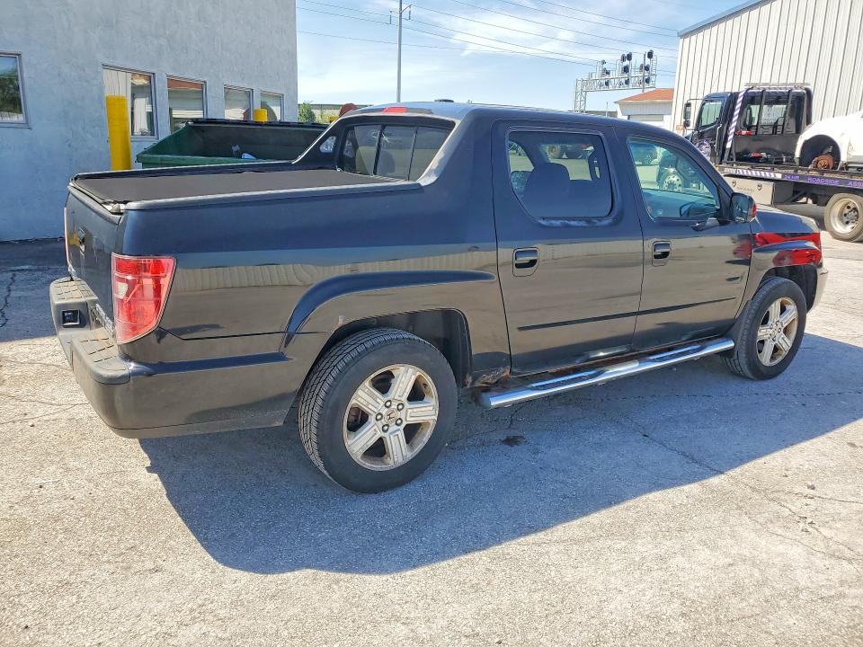 Photo 3 from auction – 2011 HONDA RIDGELINE with VIN 5FPYK1F57BB501193