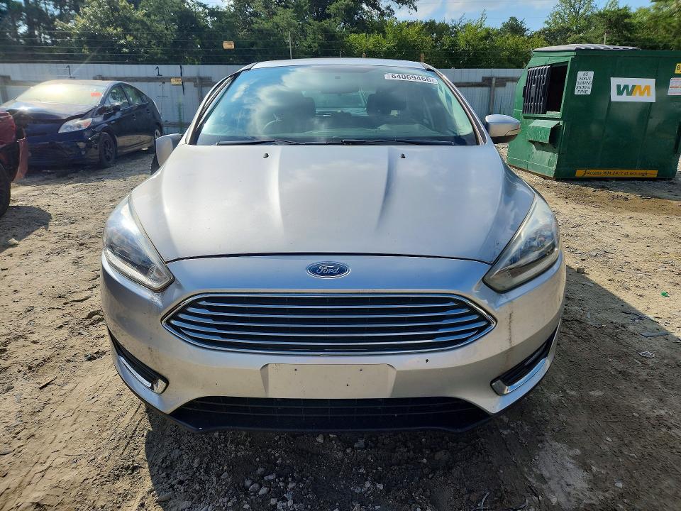 Photo 5 from auction – 2016 FORD FOCUS with VIN 1FADP3N28GL260069