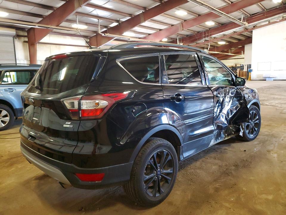 Photo 3 from auction – 2017 FORD ESCAPE with VIN 1FMCU9GD3HUA42421