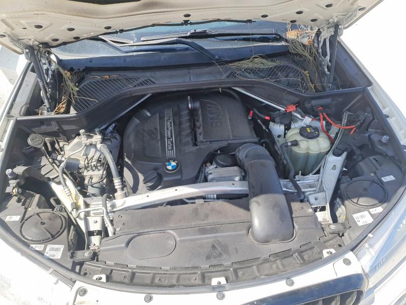 Photo 12 from auction – 2018 BMW X5 with VIN 5UXKR0C5XJ0X93359