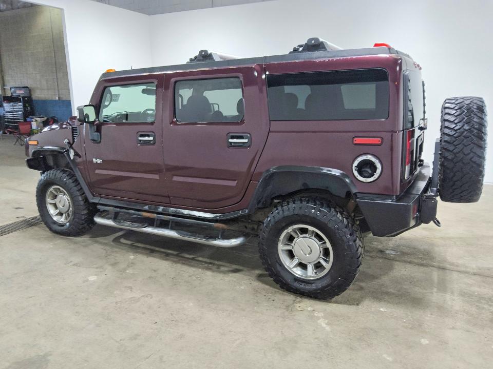 Photo 2 from auction – 2006 HUMMER H2 with VIN 5GRGN23U16H102006