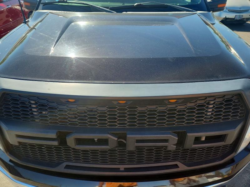 Photo 11 from auction – 2014 FORD F150 with VIN 1FTFW1EFXEKD74851