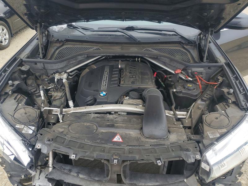 Photo 12 from auction – 2015 BMW X5 with VIN 5UXKR2C52F0H37857