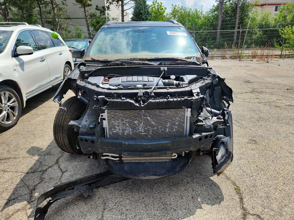 Photo 5 from auction – 2016 CHEVROLET TRAVERSE with VIN 1GNKVFKD6GJ208313