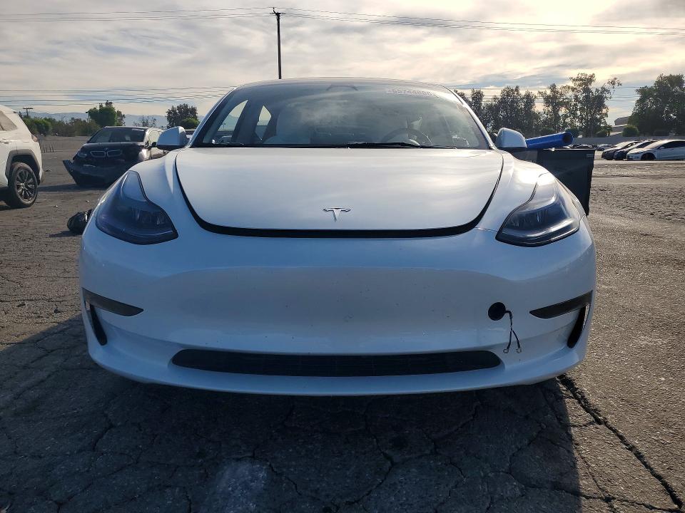 Photo 5 from auction – 2023 TESLA MODEL 3 with VIN 5YJ3E1EAXPF647944