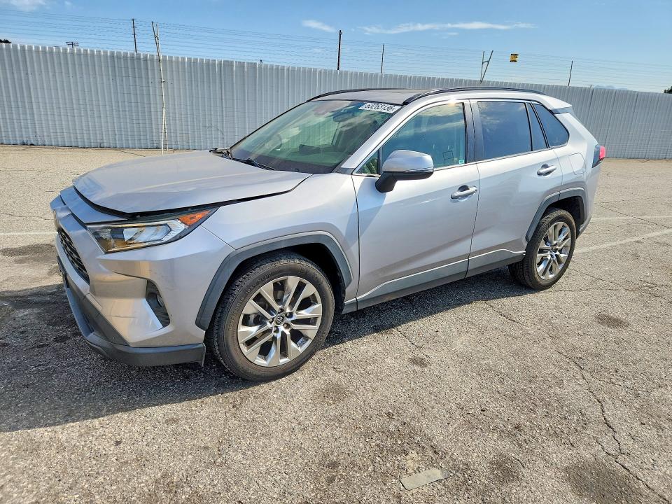 TOYOTA RAV4 2019 with VIN JTMA1RFV5KD511515 - Photo from auction