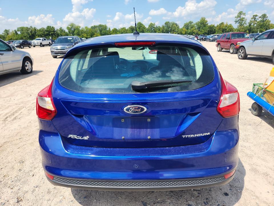 Foto 6 de la subasta – 2012 FORD FOCUS con VIN 1FAHP3N26CL320667