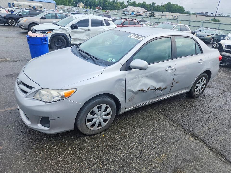 TOYOTA COROLLA 2011 with VIN 2T1BU4EE3BC704095 - Photo from auction