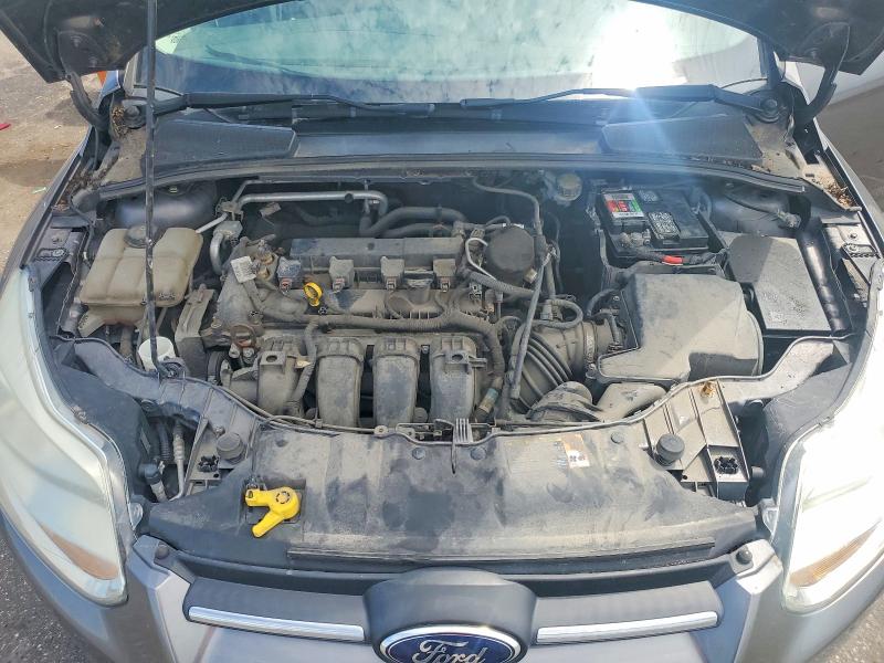 Photo 11 from auction – 2014 FORD FOCUS with VIN 1FADP3F20EL228342
