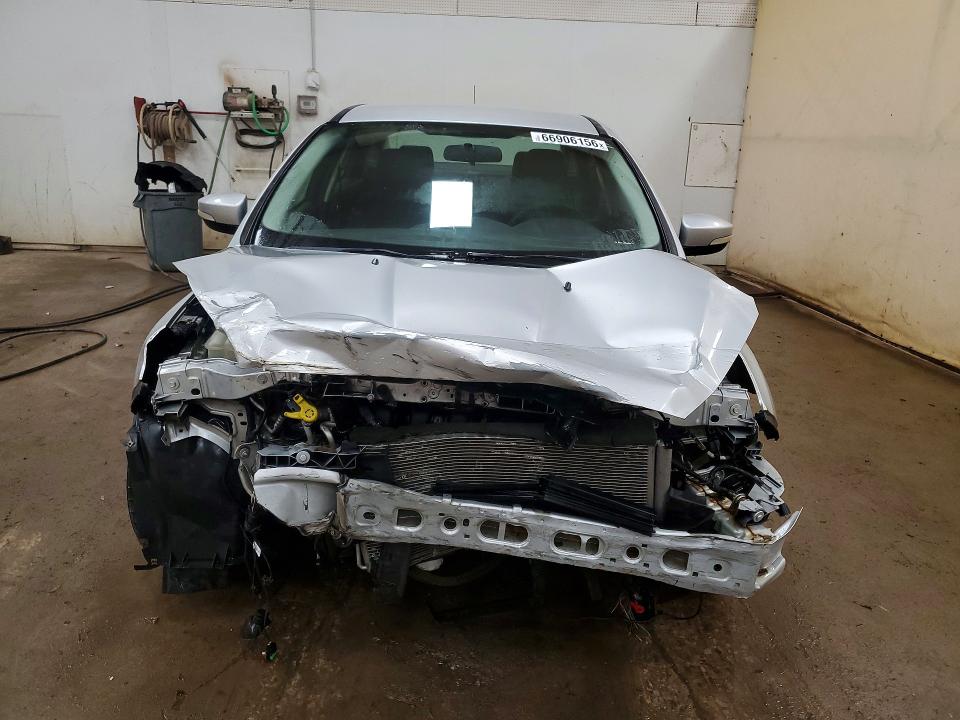 Photo 5 from auction – 2015 FORD FOCUS with VIN 1FADP3F23FL333927